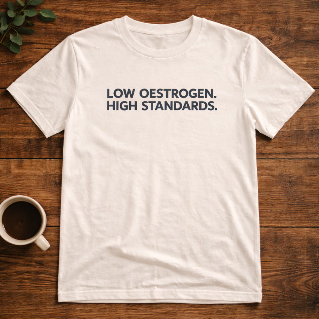 Low Oestrogen High Standards T-Shirt – Funny Menopause Tee, Perimenopause Humor Shirt, Women’s Hormone Humor Graphic Tee, Minimalist Women’s Statement T-Shirt